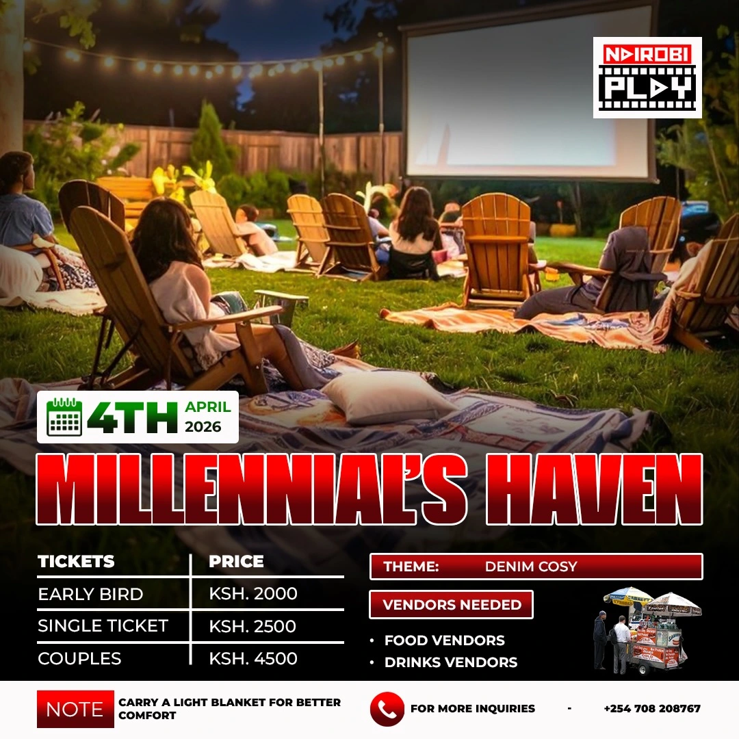 Outdoor event setup with dartboard and movie night backdrop